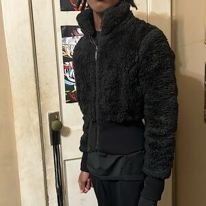 Women’s small coat. Fur bomber jacket with leather instillation.